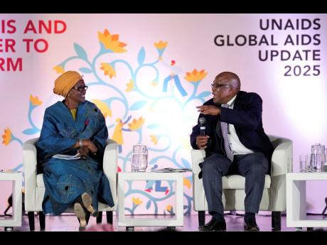 Credit: Themba Hadebe South Africa’s Minister of Health Aaron Motsoaledi (right), speaks as Winnie Byanyima, executive director of UNAIDS and under-secretary-general of the United Nations, watches on during the UNAIDS report release at Bertha Gxowa Hospital in Germiston, Sout