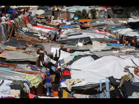Credit: Odelyn Joseph Makeshift tents fill a camp set up by people displaced from their homes by gang violence in Port-au-Prince, Haiti.