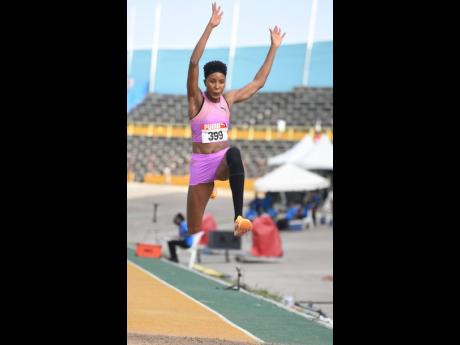 Shanieka Ricketts jumps her way to her seventh national title at the National Junior and Senior National Championships at the National Stadium.