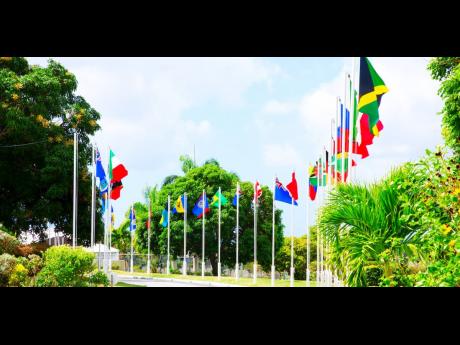 Credit: The flags of Caribbean member countries on display at Caribbean Development Bank headquarters in Barbados.