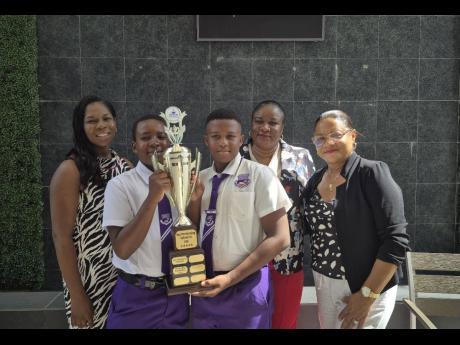 From left: CEO & Founder of EduHub Company Limited, Davia Bryan-Campbell; with Malique Allen; Mikyle Segree; Director Norine Morris-Allen (principal); Monica Luckoo (vice principal) of Orange Bay Preparatory & Kindergarten.