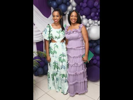 Credit: Nathaniel Stewart LaToya Campbell (left) stands with dancemom Julian Brown, sharing the excitement of the moment.