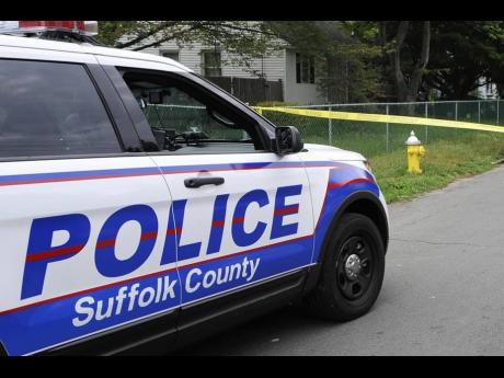 Credit: (AP Photo/Kathy Kmonicek, file) Suffolk County Police block off a street in Wyandanch, N.Y., June 4, 2015.