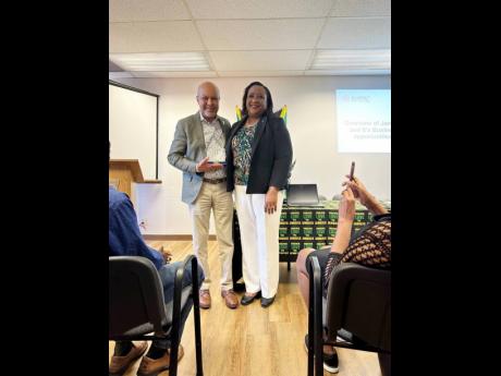 Dr Michael Vaughan  with Marsha Coore Lobban, Jamaica’s high commissioner to Canada.