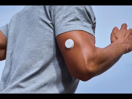 Credit: AP This image provided by Abbott’s Lingo division in July 2025 shows the Lingo wearable device for continuous glucose monitoring.