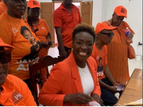 Credit: Photo by Adrian Frater A beaming Janice Allen is all smiles inside the nomination centre.