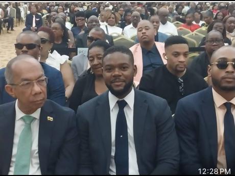 Credit: Contributed National Security Minister Dr Horace Chang (left) and Montego Bay Mayor Richard Vernon at Earle’s funeral.
