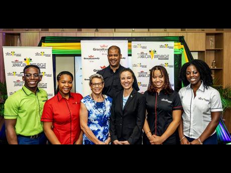 GK Birthright Interns Josiah Royes (far left), Kyrah McIntosh, Lauren Roach (second from right), and Abigail Ralph (far right), with GK Foundation Chair Professor Julie Meeks-Gardner (third from left), Minister of Foreign Affairs and Foreign Trade Senator 