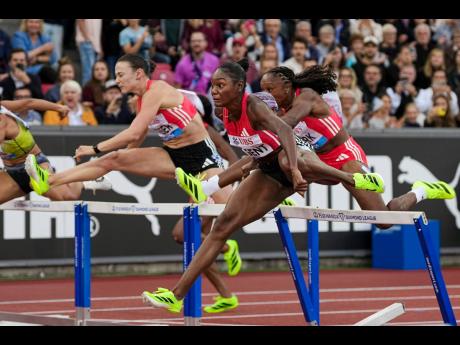 Jamaica’s Ackera Nugent (second right) clocks 12.30 seconds  in the 100m hurdles and becomes the first Jamaican to win the Diamond League title since Danielle Williams in 2019.