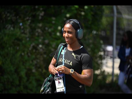 Shelly-Ann Fraser-Pryce arrives for training at the Athletic Stadium at the Oi Central Seaside Park Sports Forest in Tokyo, Japan, on Thursday.
