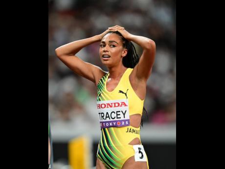 Credit: Gladstone Taylor A dejected Adelle Tracey moments after competing in the women’s 1,500-metre qualifiers at the Japan National Stadium in Tokyo yesterday. Tracey finished 13th in heat three.