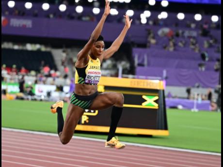 Credit: Gladstone Taylor Shanieka Ricketts competing in the women’s triple jump qualification round at the World Athletics Championships inside the Japan National Stadium in Tokyo yesterday.