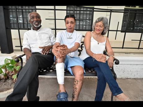 
The grateful Robinsons - Lincoln and Barbara - flank Sasha Bartley, who came to their rescue during the frightening ordeal.