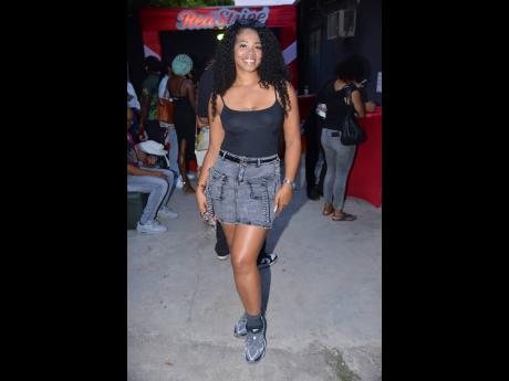Credit: Antoine Lodge Media personality and content creator Kerry-Ann ‘Chiney K’ Collins paired trainers with a cargo skirt and cami.