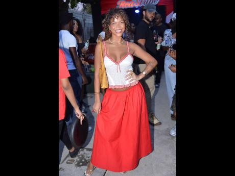 Credit: Antoine Lodge Reggae and R&B fusion songbird Elle matches the theme of the night with a playful bustier on top and a flowy maxi skirt.