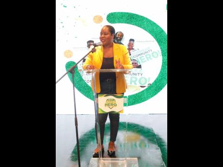 Credit: Contributed Chloleen Daley-Muschett, Supreme Ventures Limited assistant vice president of public relations and corporate affairs, delivers an overview of the Supreme Ventures Foundation Supreme Community Hero Programme during the Grand Finals at the ROK Hotel last Thu