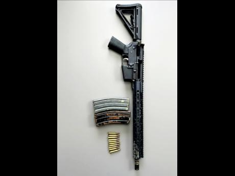 The multi-calibre AM-15 rifle seized in St Thomas.