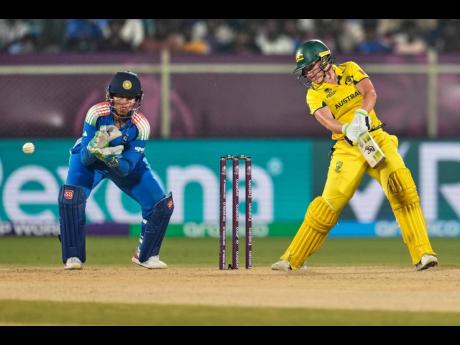 Australia’s captain Alyssa Healy plays a shot during the ICC Women’s Cricket World Cup match between India and Australia at ACA-VDCA Cricket Stadium in Visakhapatnam, India, yesterday.