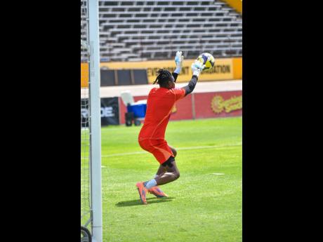 Reggae Boy captain and goalkeeper Andre Blake goes through his paces during a training session yesterday at the National Stadium in preparation for today’s Concacaf World Cup Qualifier against Bermuda at the same venue. The game begins at 7 p.m.