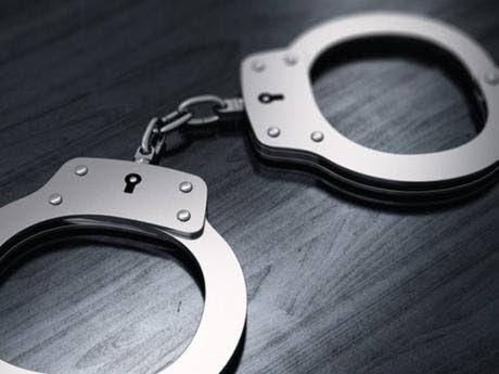 The 42-year-old guard was arrested at premises in St Andrew late Thursday.