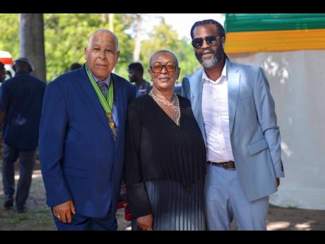 Lloyd ‘King Jammy’ James (left) was conferred with the Order of Distinction in the rank of Commander for his sterling contribution to Jamaica’s music Industry and innovation in reggae and dancehall. His wife, Iris James, and son Trevor ‘Baby G’ J
