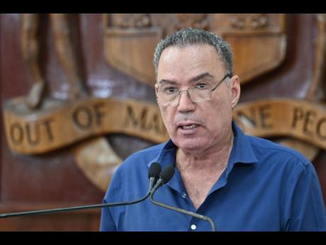 Transport Minister Daryl Vaz speaking at a special press briefing at the Office of the Prime Minister in St Andrew on October 23.
