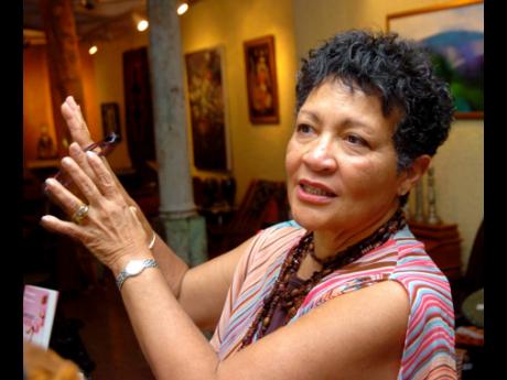 Credit: File File Photos
Yvonne Brewster speaks with guests at the signing for her book ‘The Undertaker’s Daughter’ at the Bolivar Bookshop in St Andrew on January 8, 2005.