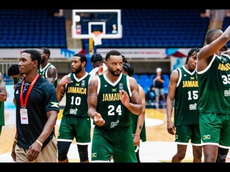 Credit: Courtesy of FIBA
Jamaica and Miami Heat player, Norman Peart, tries to motivate his players during a FIBA Basketball pre-qualification competition recently.