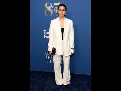 Credit: AP Ilana Glazer dons an oversized white suit.