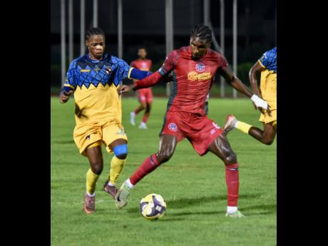 Credit: Ashley Anguin Montego Bay United’s Lucas Lima Correa (right) tries to dribble away from Racing United’s Tameish Richardson during their Jamaica Premier League (JPL) match at the Montego Bay Sports Complex in Montego Bay on Sunday, October 19.