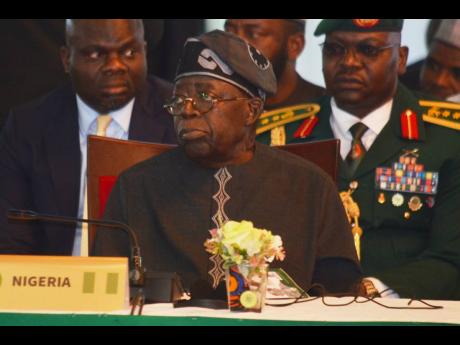 Credit: Olamikan Gbemiga Nigerian President Bola Ahmed Tinubu attends an ECOWAS meeting in Abuja, Nigeria, Sunday, June 22, 2025. (AP Photo/Olamikan Gbemiga, File)