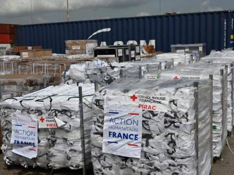 Credit: Contributed Life-saving emergency supplies delivered by the French Navy through European Union emergency coordination mechanism at the Kingston Freeport Terminal Limited on Monday.