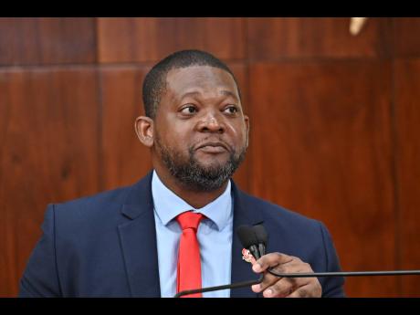 Commander Alvin Gayle, newly appointed director general of the Office of Disaster Preparedness and Emergency Management, addresses yesterday’s special press briefing on Hurricane Melissa at Jamaica House in St Andrew.