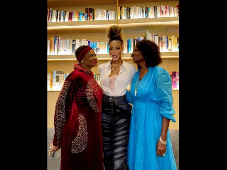 Supermodel Winnie Harlow (centre) with her mother Lisa Brown (left) and grandmother Princess Brown at an event hosted by Penguin Workshop last week.
