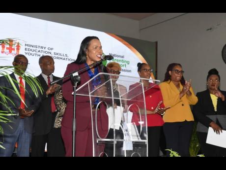 Permanent Secretary in the Ministry of Education, Skills, Youth and Information, Dr Kasan Troupe, addressing the launch of National Parent Month on November 12 at Tivoli Gardens High School in Kingston.
