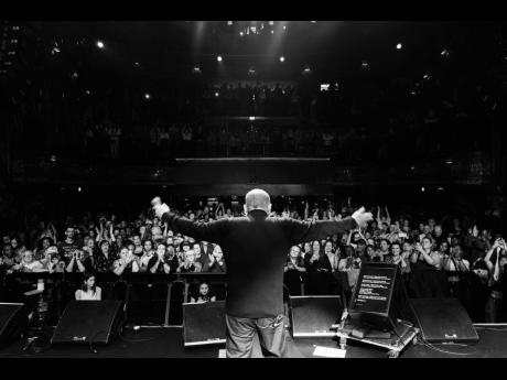 Credit: Alex Kelly Ali Campbell’s performance draws the crowd in, with fans recording each moment.