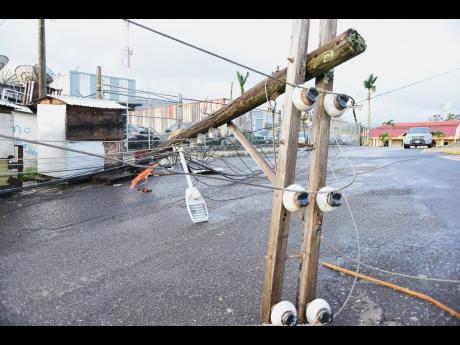 A JPS electricity pole on Nashville Avenue in Mandeville, Manchester, which snapped and fell during the passage of Hurricane Melissa.