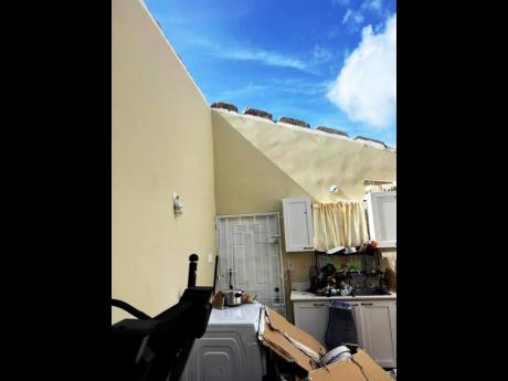Damaged property in Union Acres, St James.