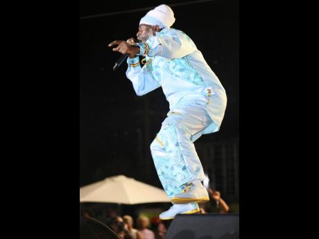 Credit: Nathaniel Stewart Capleton commands the crowd, delivering a fiery set in support of farmers and fisherfolk at Sunday’s Treasure Beach Rum, Food & Reggae Festival.