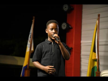Credit: Antoine Lodge Soloist Jovanni Richards delights the crowd with his voice.