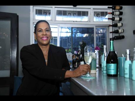 Fashion expert and entrepreneur, Sophia Max-Brown, enjoys a sip of the Cipriani Prosecco at TRIO Grill Wine Bar.