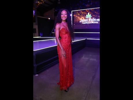 Vanessa Davidson, international fashion model and the evening’s pageant judge, dons an off-the-shoulder maxi with petal appliqué