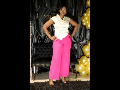 Credit: GERALD A GORDON Shereece Rowe, employee relations manager at Factories Corporation of Jamaica Limited, keeps her look casually cute in this pink-and-white ensemble.