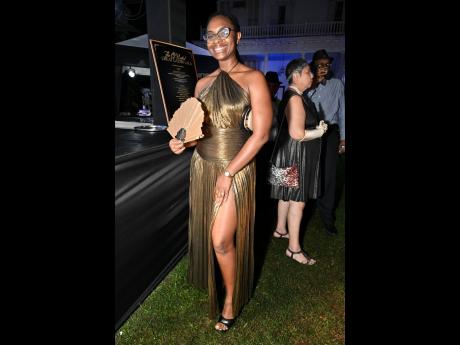 Credit: Rudolph Brown Below: Attorney-at-law Ashley Campbell’s choice of dress is a fashion do in our books.